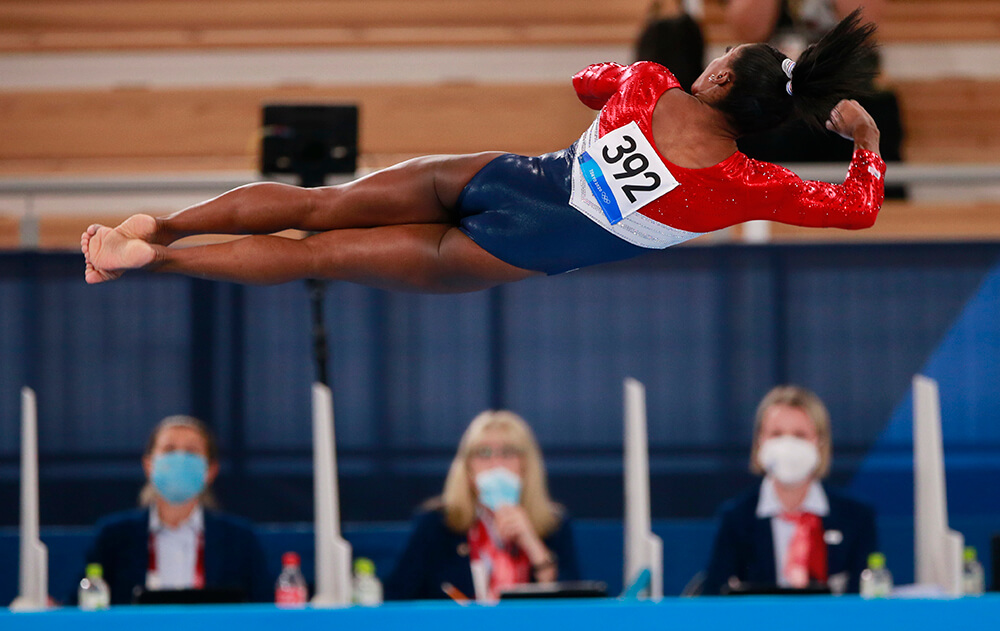 Simone Biles (USA) en competición, fotografía deportiva por Miguelez