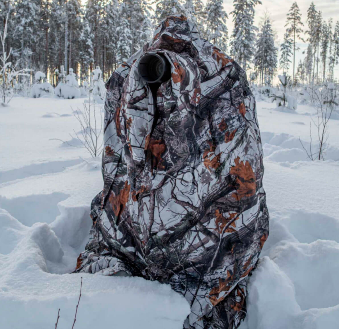 Capellina de camuflaje de nieve para fotografía de fauna